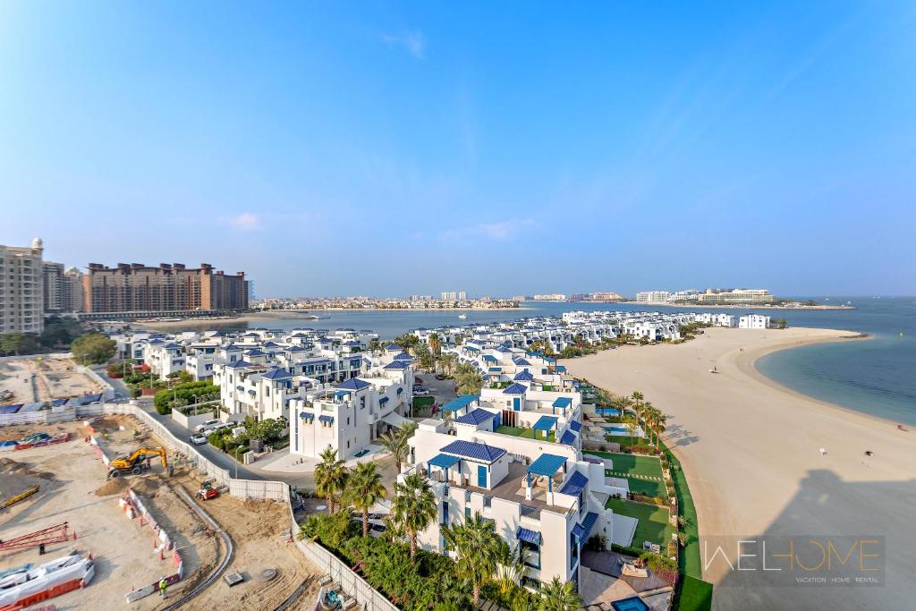 هتل ول هوم - بریت تیکینگ 1 بی آر آپارتمان شورلاین د پالم - WelHome - Breathtaking 1BR Apartment Shoreline The Palm