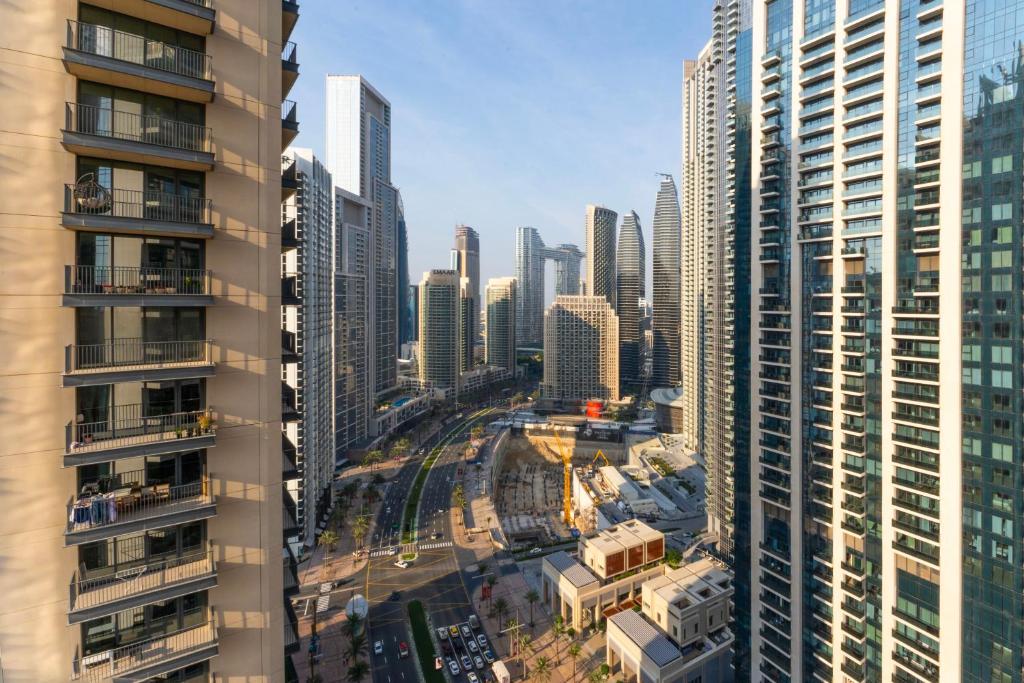 هتل ترانکویل هایتس: آ 2BR اسکیپ این د هارت اف بولورد کسرنت تاور - Tranquil Heights: A 2BR Escape in the Heart of Blvd Crescent Tower