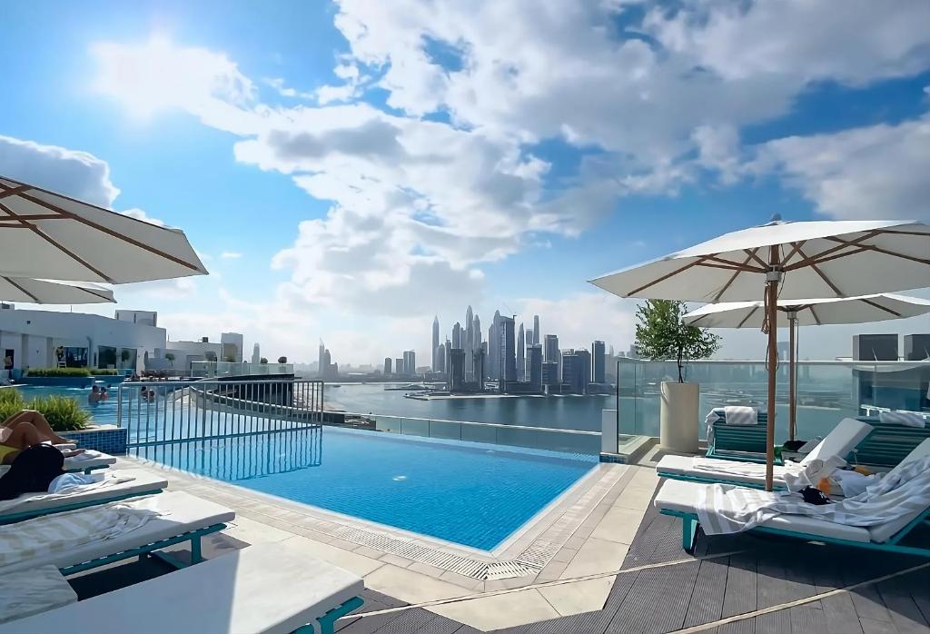 هتل منزل - 1BR در سون پالم با اینفینیتی پول و پرا Private بیچ اکسس - Manzil - 1BR in Seven Palm with Infinity Pool & Private Beach Access