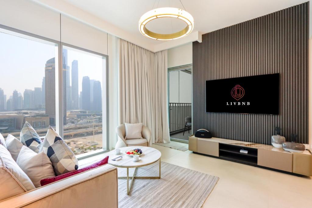 هتل لیو بی ان بی سویتز - لاویش 2 بی آر و/ برجی خیلفه ویوز اند نیر دبی مال - Livbnb Suites - Lavish 2BR w/ Burj Khalifa Views & Near Dubai Mall
