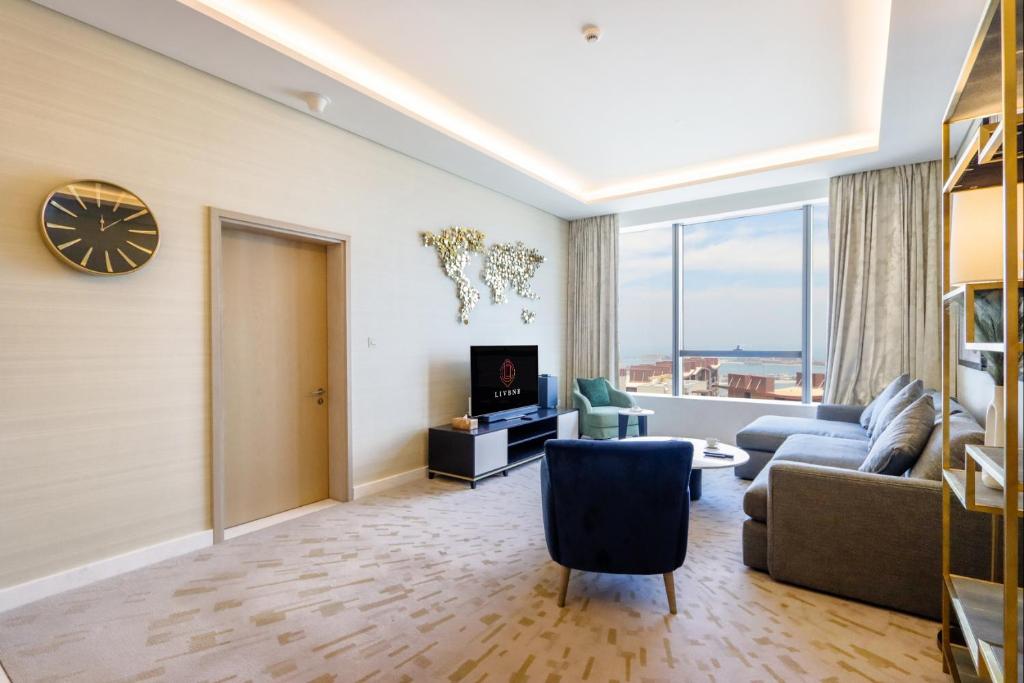 هتل لیو بِن بی سوئیتس - 1 بی آر و/ سی ویو این پام تاور - Livbnb Suites - 1BR w/ Sea View in Palm Tower