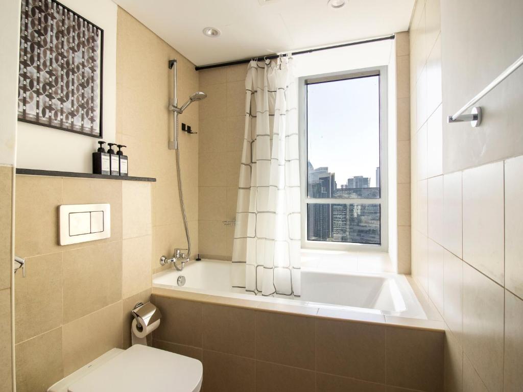 هتل دانتون شیک ایزی واک تو دبی مال اند فونتین - Downtown Chic Easy walk to Dubai Mall & Fountain