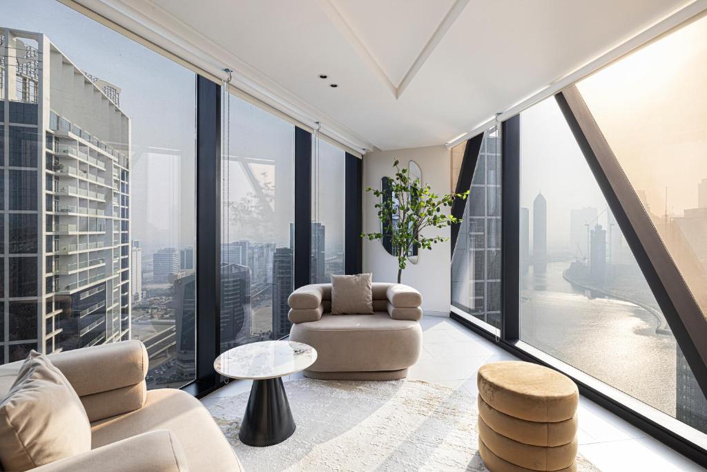 هتل مگنیفیسنت 3بی آر اسپکتاکولار کانال اند برج ویو - Magnificent 3BR Spectacular Canal & Burj View