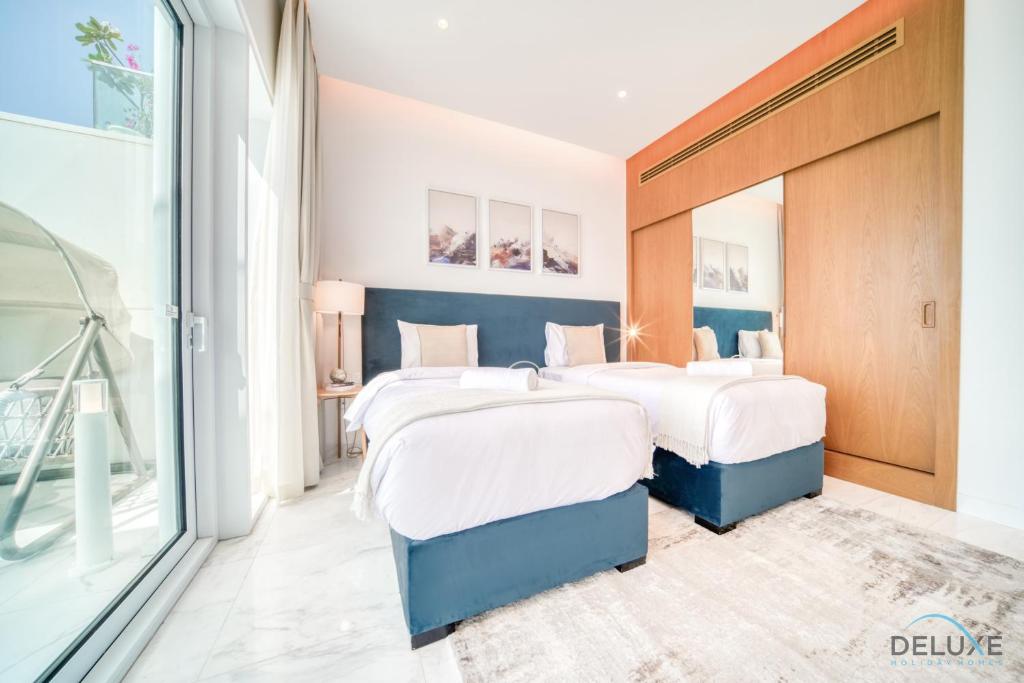 Serene 2BR Sea View Apartment with Assistant Room in One JBR by Deluxe Holiday Homes