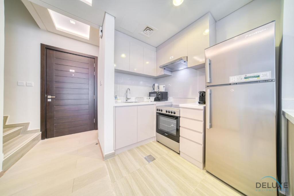 Magnificent 3BR Townhouse at DAMAC Hills 2, Dubailand by Deluxe Holiday Homes