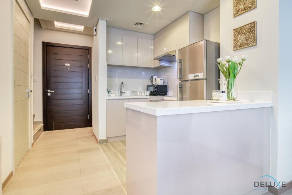 Magnificent 3BR Townhouse at DAMAC Hills 2, Dubailand by Deluxe Holiday Homes