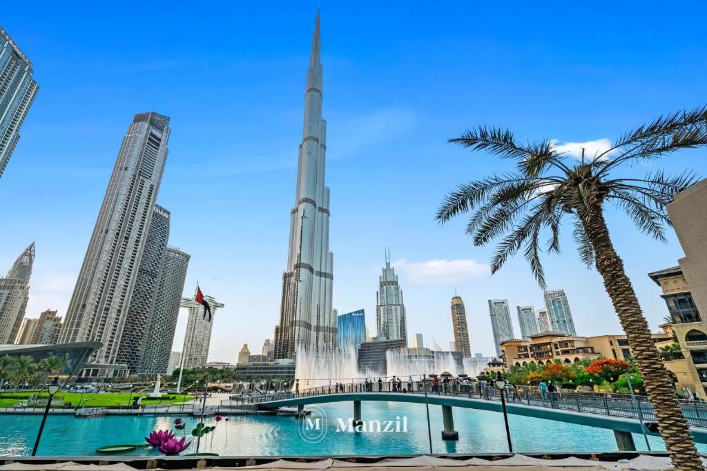 هتل منزیل - لاکچری 3BR ویلا و/ ماید روم، فول برج و فونت ویو Manzil - Luxury 3BR Villa w/ maid room, Full Burj & Fountain view