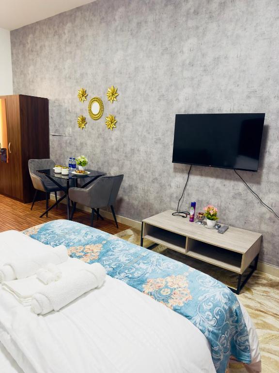 هتل کوزی آپارتمان این جمیرا ویلاج سرکل، دبی. - Cozy Apartment in Jumeirah Village Circle, Dubai.