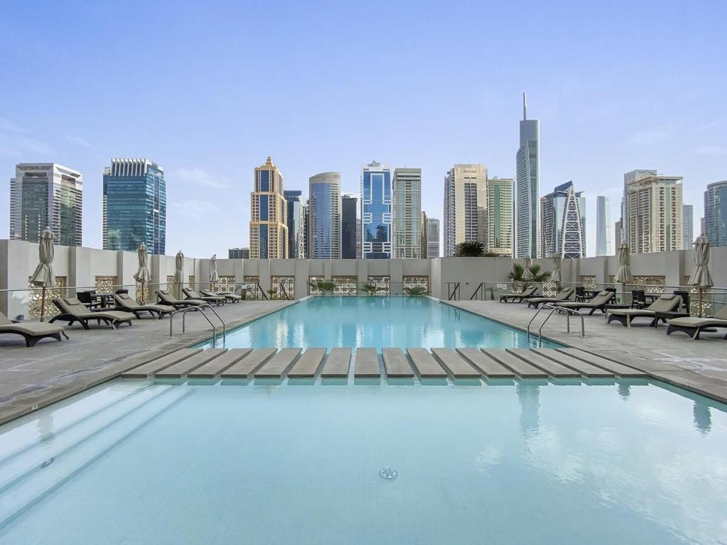 هتل سیلکهاوس شیک 1بی دی آر این وست آونیو وید پول اند جیم اکسس - Silkhaus chic 1BDR in west avenue with Pool & gym access