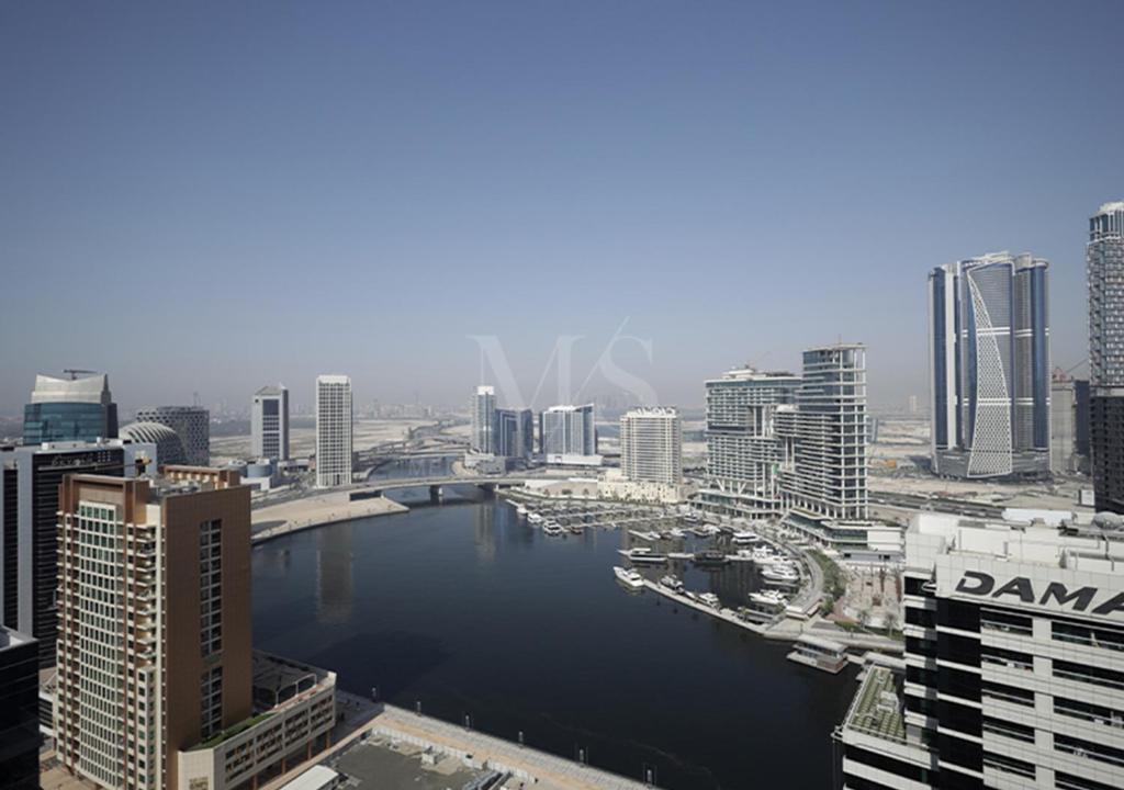 هتل ام اچ-۱ بی اچ کی با استُنینگ کانال ویو این ریوا ریزیدنس رف ۲۶۰۱۴ - MH-1 BHK with Stunning Canal View in Reva Residence Ref 26014