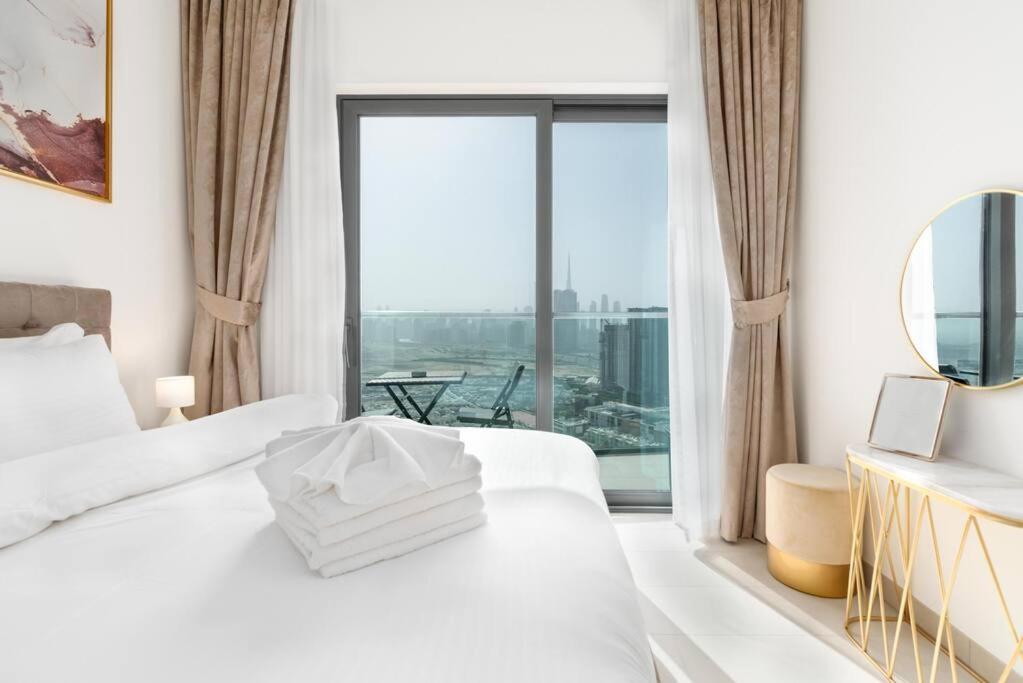 هتل 10 دقیقه تا برج خلیفه، استخر، وای فای - سوبها ویوز - دبی - 10' to Burj Khalifa, Pool ,Wifi - Sobha Waves - Dubaï