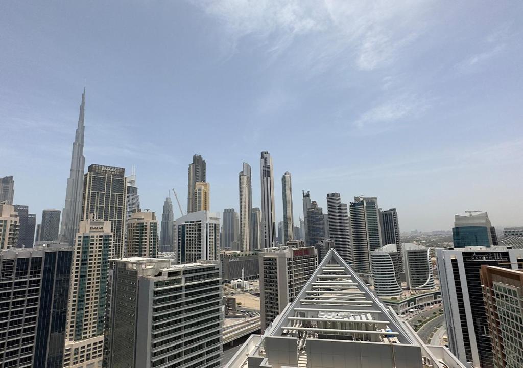 هتل ام اچ- رووا داونتاون کانال اند برج ویو - ۱بی اچ کی ریف ۲۶۱۷ - MH- REVA Downtown Canal & Burj View -1BHK Ref 2617