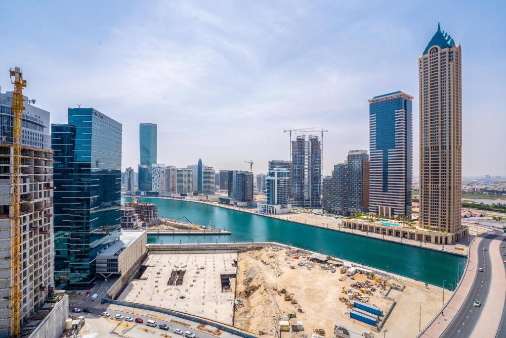 هتل تنین - اکسکوئیزیت 1BR آپت این زادا تاور ویت کانال ویوز - Tanin - Exquisite 1BR Apt in Zada Tower with Canal Views