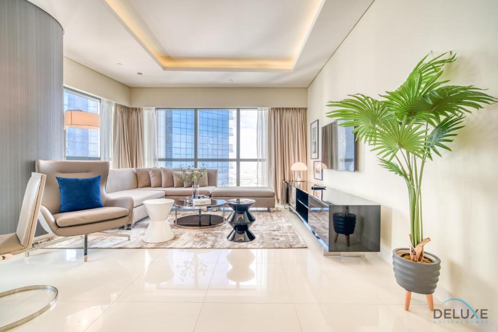 هتل سوفیستیکیتد 2BR ات داماک تاورز بای پارامونت آ بیزنس بی بای دلاکس هالیدِی هومز - Sophisticated 2BR at DAMAC Towers by Paramount A Business Bay by Deluxe Holiday Homes