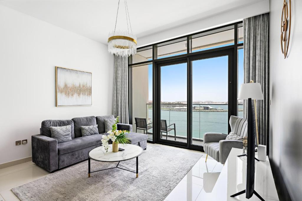 هتل سیساید سرنیتی: 1-بی آر آپارتمان ویت بیچ اکسس - Seaside Serenity: 1-BR Apartment with Beach Access