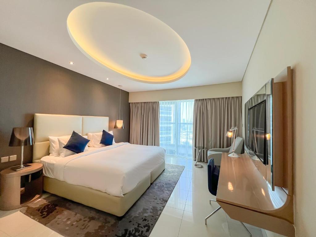 هتل لوتون ویکیشن هومز - دماک پارامونت 2BR های فلو، بیزنس بی، دبی 61AB06 - Luton Vacation Homes - Damac Paramount 2BR High Floor, Business Bay, Dubai 61AB06