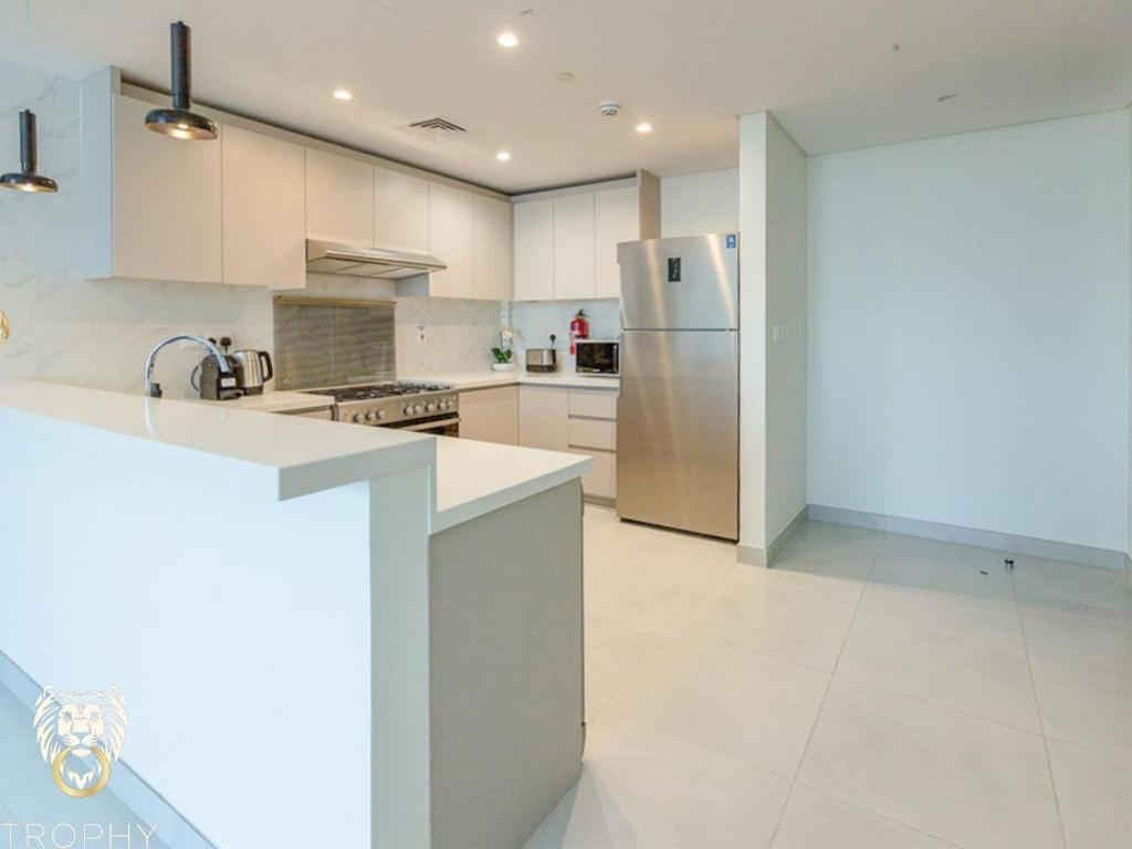 هتل لاکچری 1BR آپت ویت اناباسترکتد دبی فریم ویو - Luxury 1BR Apt with Unobstructed Dubai Frame View