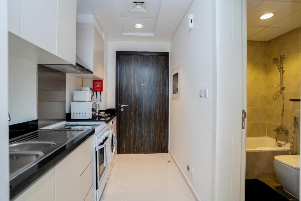 هتل تنین - استودیوها در داماک هیلز کارسون تاور سی - Tanin - Studios at Damac Hills Carson Tower C