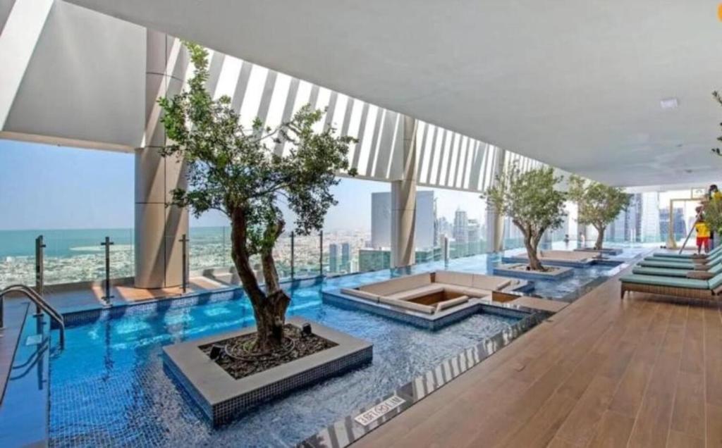 Vacay Lettings - Burj Khalifa View 3 bed at Paramount Midtown