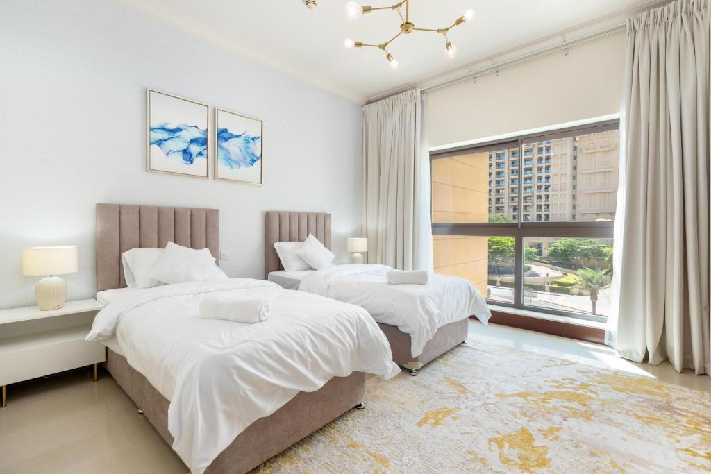 Palm Oasis Retreat in Palm 2BR Teal & Gray Elegance Palm Jumeriah- Private Beach & Fairmont Access