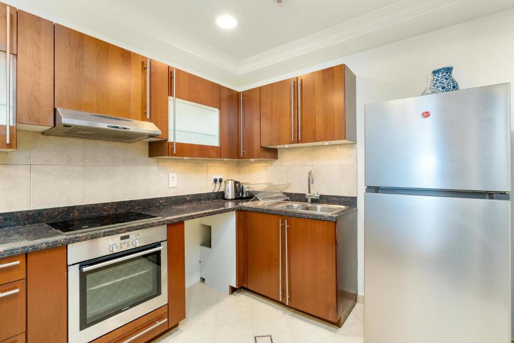 Palm Oasis Retreat in Palm 2BR Teal & Gray Elegance Palm Jumeriah- Private Beach & Fairmont Access