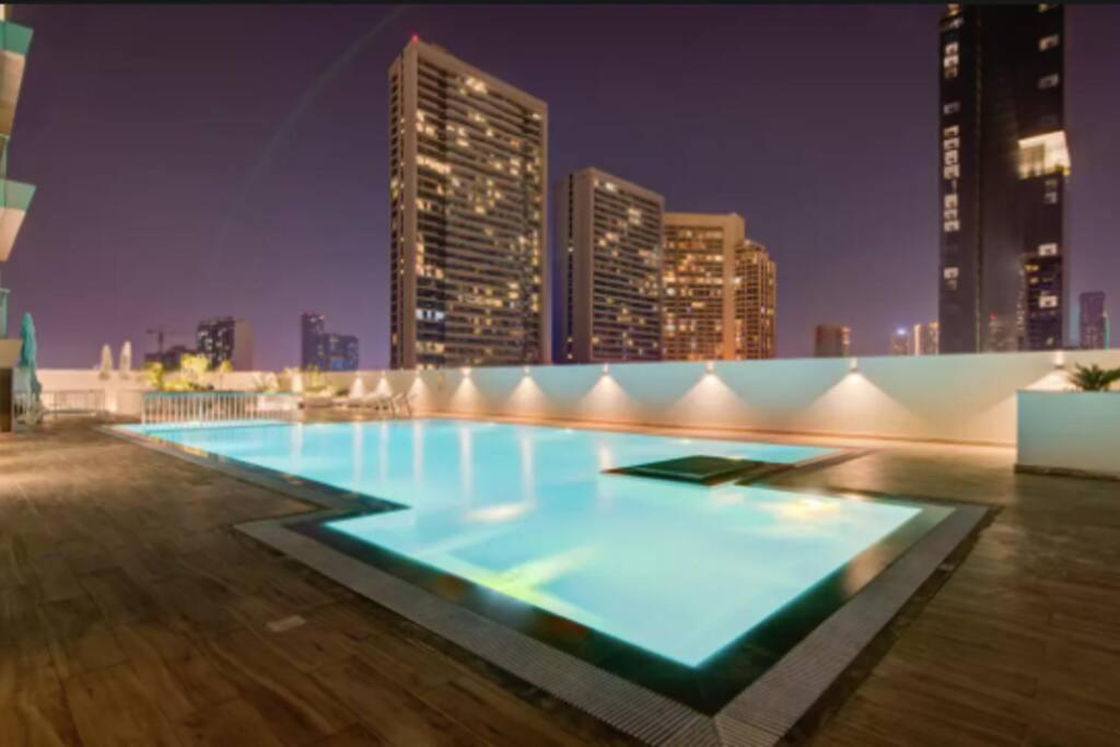 هتل لاولی وان بدروم - پول، جیم اند سونا - Lovely one bedroom - Pool, gym and sauna