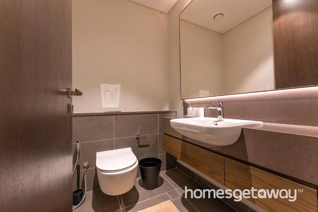 هتل هومزگت اوی - 1BR الیگنت آپارتمان در جمیرا لیوینگ مارینا گیت - HomesGetaway -1BR Elegant Apartment in Jumeirah Living Marina Gate