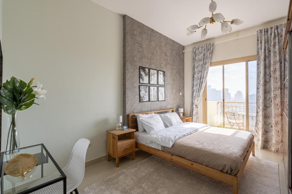 هتل های گوستس - لوکزیوس 1 بی آر آپارتمان ویت بالکنی این جی وی سی - HiGuests - Luxurious 1BR Apartment with balcony in JVC