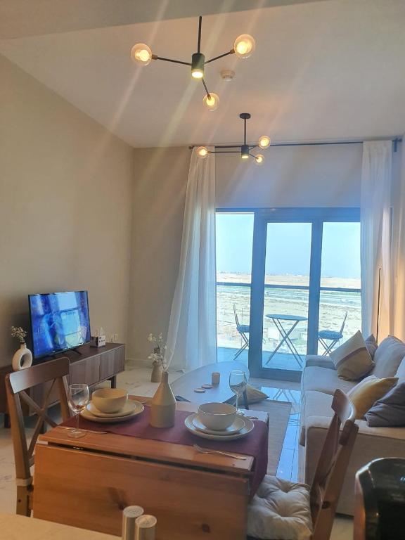 هتل کوزی 1-بد روم آپارتمان این دبی ساوت ویت پول - Cozy 1-bedroom apartment in Dubai South with Pool
