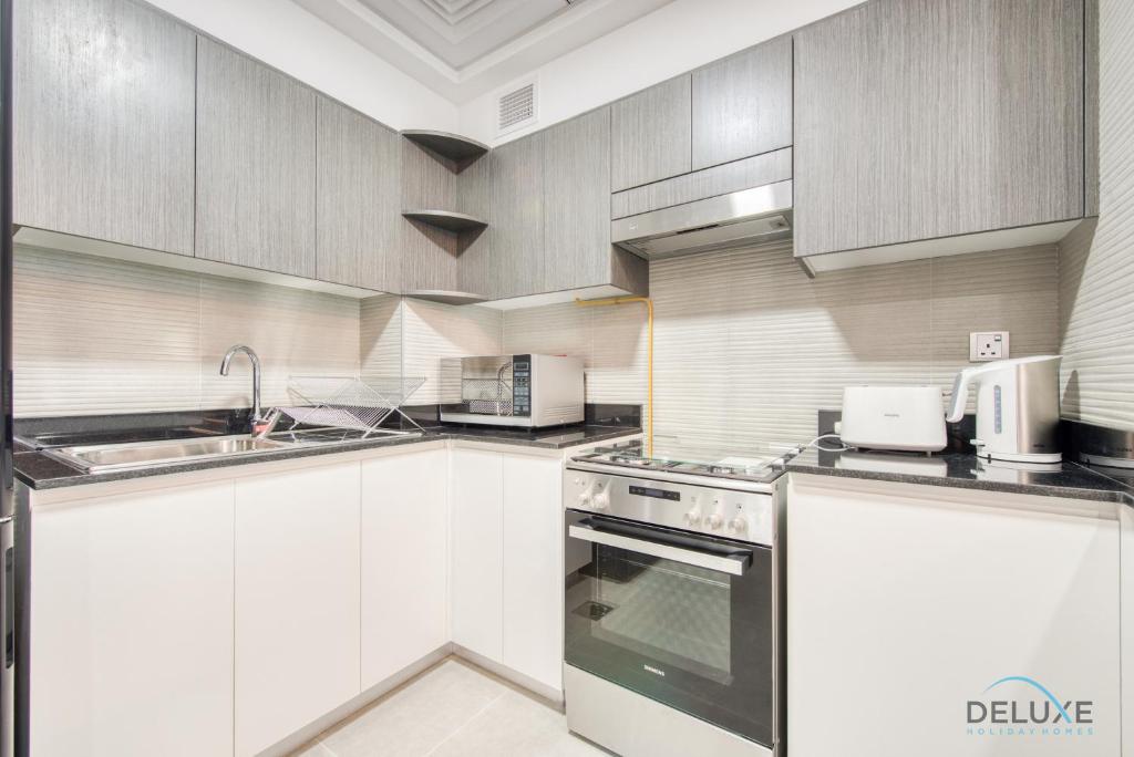 هتل استایلیش 2 بی آر این بلا رز ال بارشا ساوت بای دلاکس هالیدے هومز - Stylish 2BR in Bella Rose Al Barsha South by Deluxe Holiday Homes