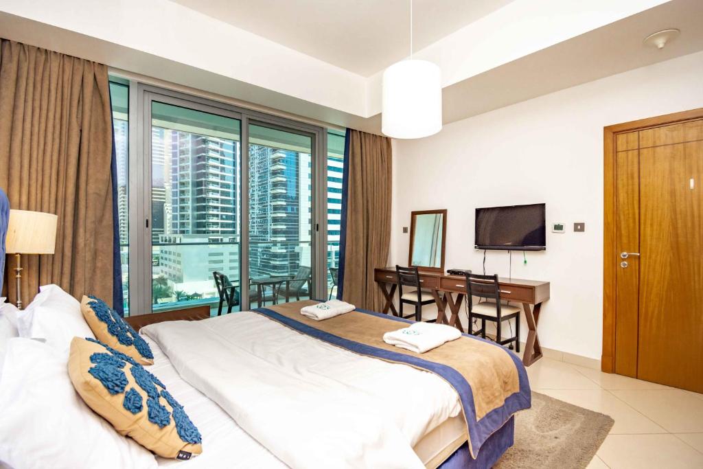 هتل استایلیش اند لیک 1 بد + استادی نیار د جی بی آر بیچ - Stylish and Sleek 1 Bed + Study near the JBR beach