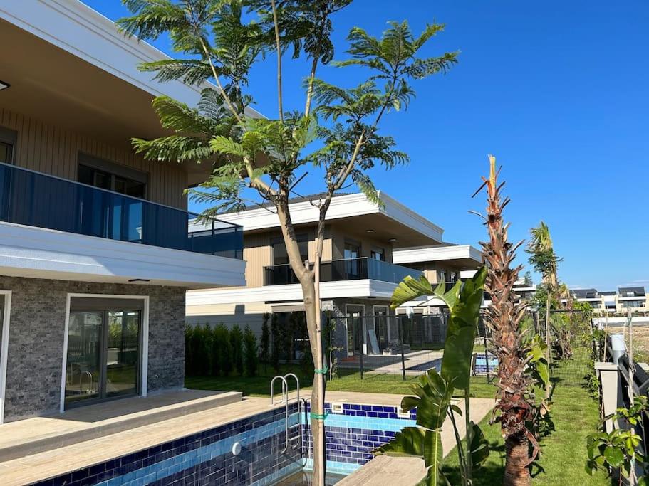 هتل آنتالیا بلیکته اوزل هاووزلو ویلا سایتی Antalya Belek'te özel havuzlu villa sitesi