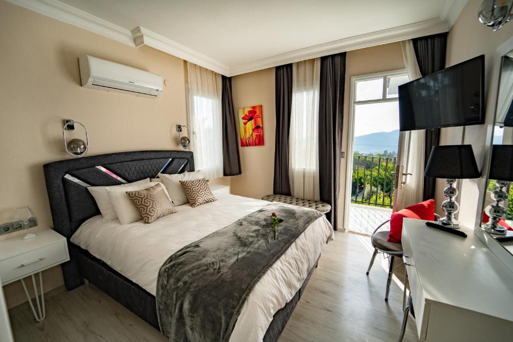 هتل Carrington Suites (Hotel), Oludeniz (Turkey) Deals