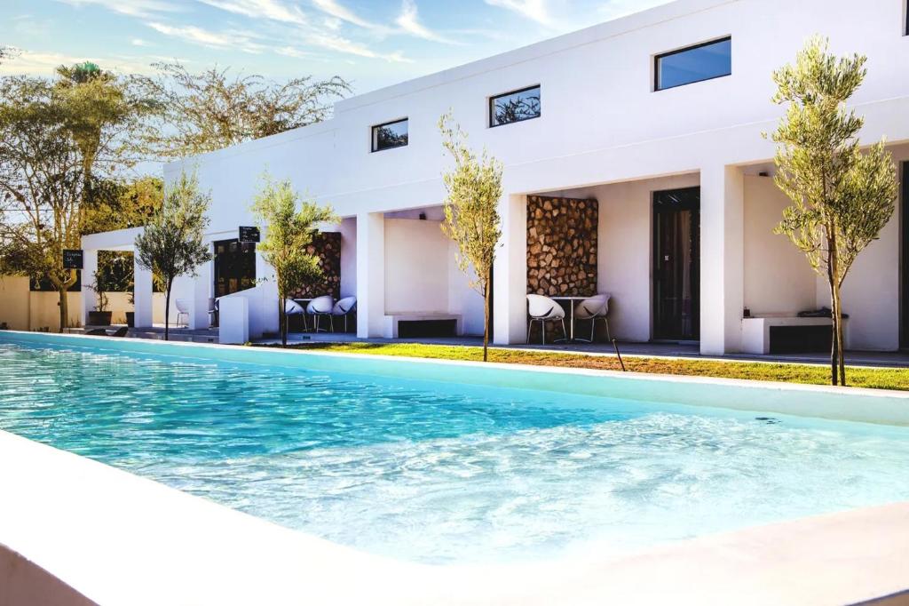 هتل کارو ریتریت- سلف کترینگ ویلاها و بد اند بریکفست Karoo Retreat- Self Catering Villas and Bed & Breakfast