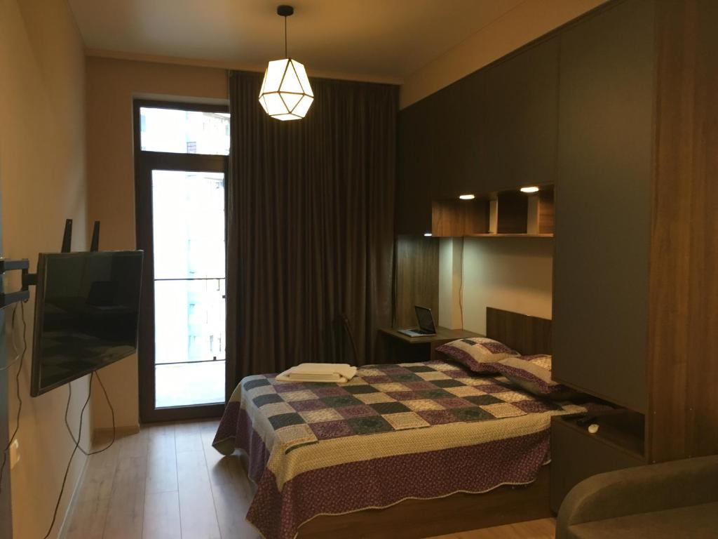هتل آپارتمنت آن واجا ایورلی استریت. تفلیس (آی) - Apartment on Vazha Ivereli St. Tbilisi (I)