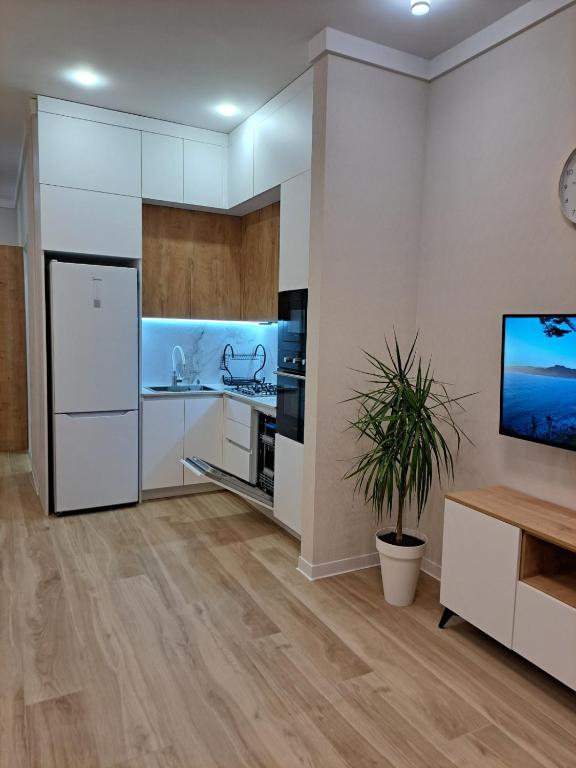 هتل کوزی آپارتمان آن مارشال گلاوانی آونیو 53a - Cozy apartment on Marshal Gelovani avenue 53a